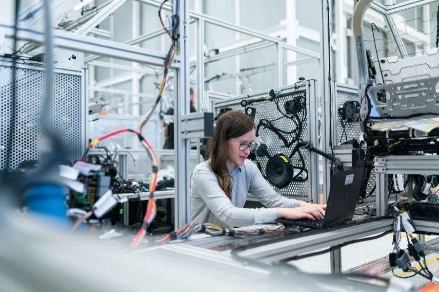 Technician working on an automated production line